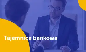Dwóch mężczyzn w garniturach rozmawia o zwolnieniu z tajemnicy bankowej.