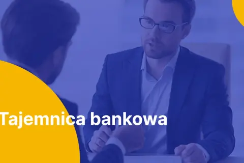 Dwóch mężczyzn w garniturach rozmawia o zwolnieniu z tajemnicy bankowej.