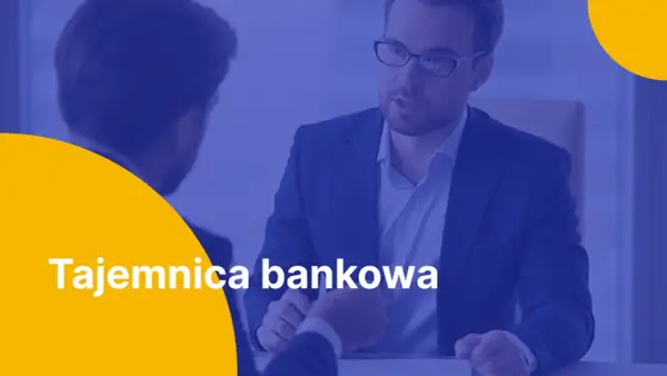 Dwóch mężczyzn w garniturach rozmawia o zwolnieniu z tajemnicy bankowej.